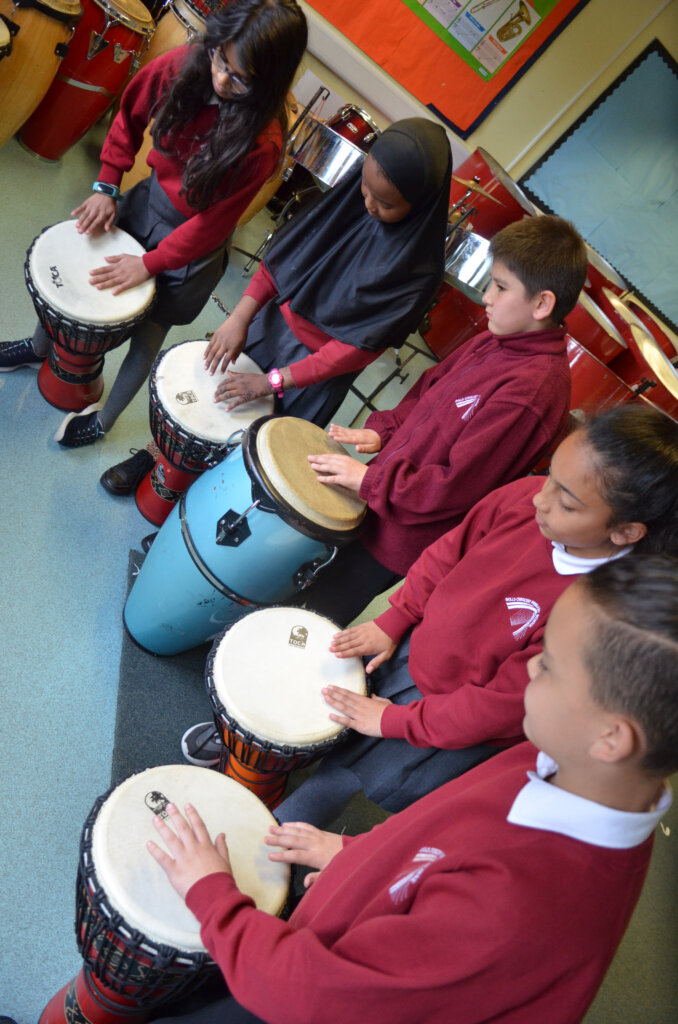 Students playing Congas