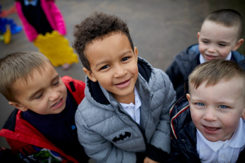 A group of young boys in the playground.