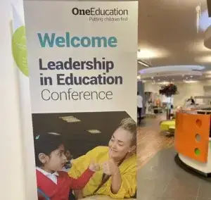 A banner for the Leadership in Education Conference.