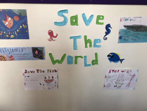 A "Save the World" poster created by children.