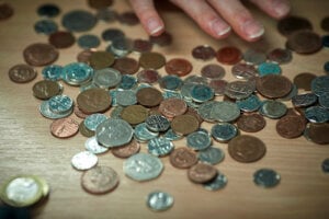 Coins scattered on a table.