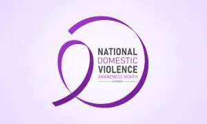 A banner marking Domestic Abuse Awareness Month
