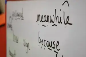 Teaching vocabulary on a school whiteboard.