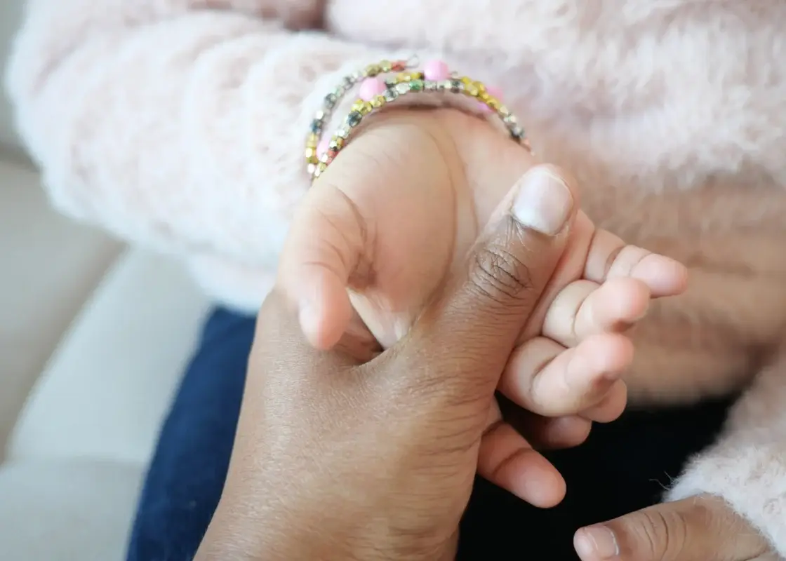 father holding hand of baby child 2024 12 13 03 22 04 utc