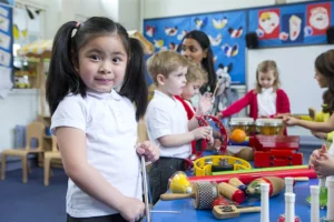 early years pupil with music intruments