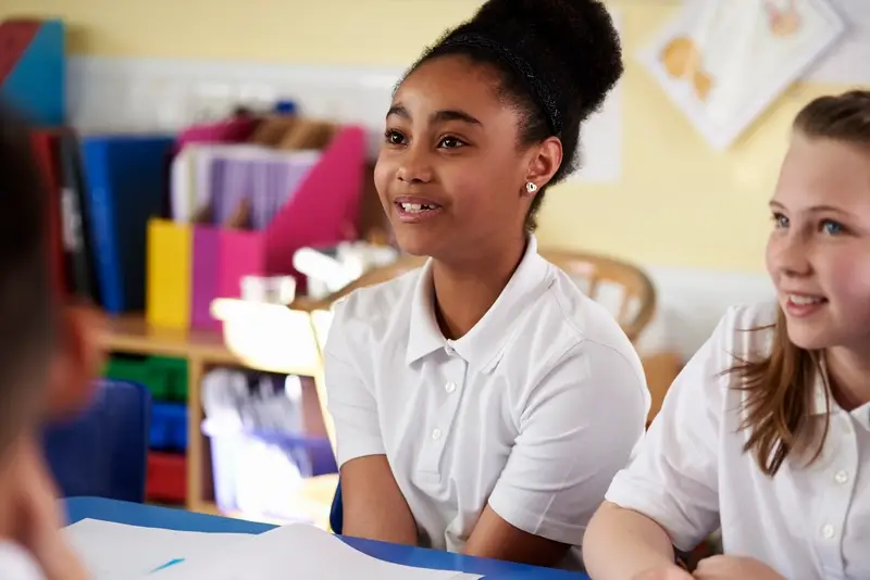 pupil looks towards front of class