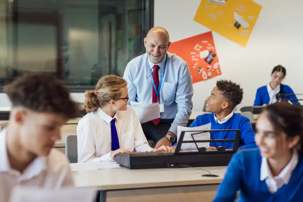 music teacher helps pupils