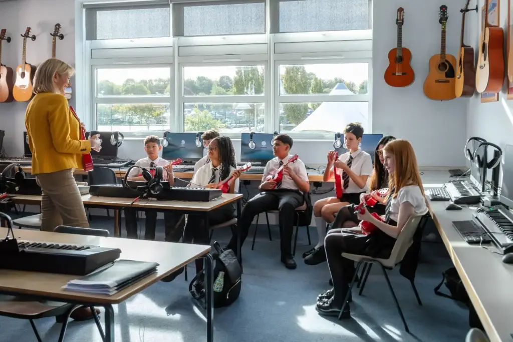 music teacher with a group of pupils
