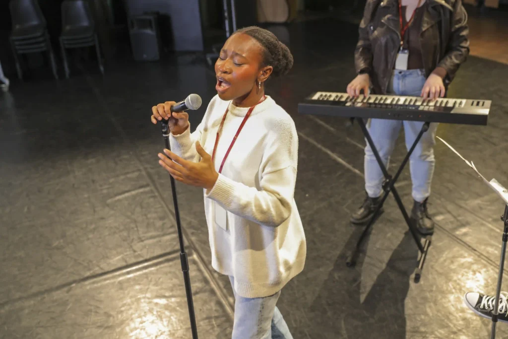 pupil sings in secondary school