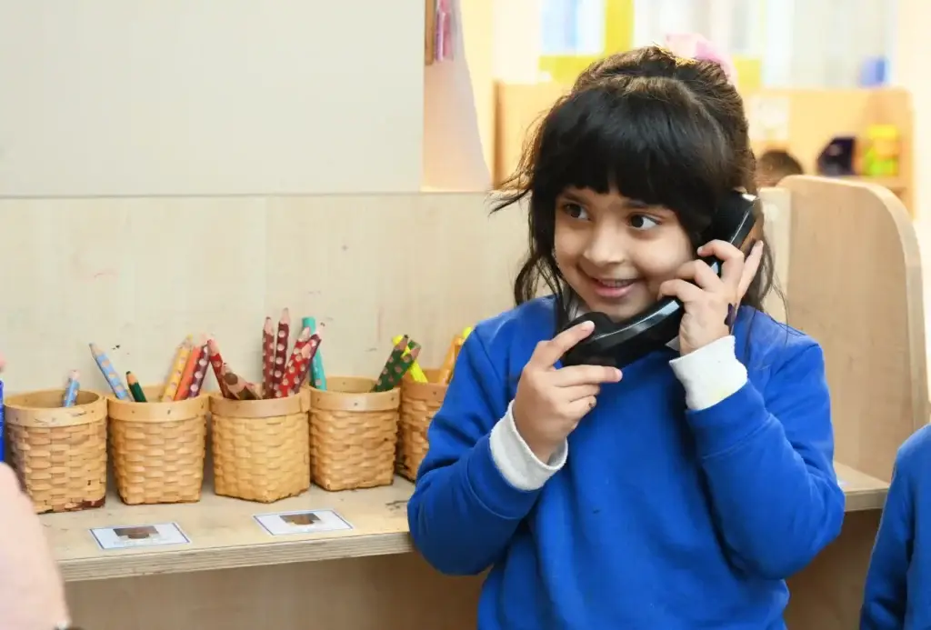 pupil on phone