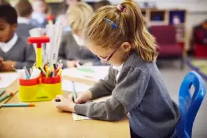 enthusiastic child drawing with markers at school 2026 03 25 02 15 27 utc