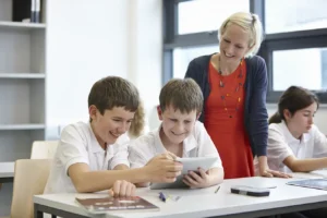 enthusiastic students using tablet in classroom wi 2026 01 09 08 36 12 utc